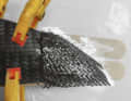 ...rebuilt with carbon fibre fabric and a filling of resin and carbon fibres