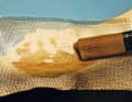 Two layers of glass fibre fabric are sparingly laminated ...