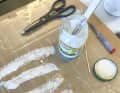 Now narrow strips of glass fibre are impregnated with thickened resin.