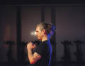 Now lower your upper body and keep your back straight at all times. From the lowest position, push yourself up again.