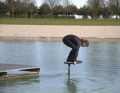 After the cat jump onto the board, bring both feet into the right position as quickly as possible. Your hands provide a little extra control. You are still on all fours.