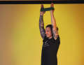Now stretch the band upwards over your head and exhale.