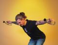 Now raise your arms sideways. The back shoulder is a small muscle and small weights are sufficient.  20 repetitions in four sets with water bottles is absolutely sufficient to start with.