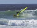 Initiate the turn towards the wave by consistently applying pressure to the heels, whilst easing off the sail.