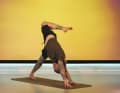 Downward facing dog yoga exercise with focus on the hips