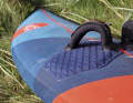 Good straps are now standard on all boards. Starboard (2) also offers extremely good cushioning pads.
