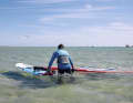 At the beginning, set your board on a half-wind course (across the wind)...