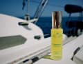 The first product was a hair oil to care for hair damaged by the sun and salt water