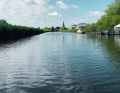 Start of the "Hidden Waters of New Jork" tour in Buxtehude harbour with a view of the Buxtehude church tower.