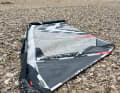 1. Shoving the mast up from below through the mast pocket of a sail that hasn’t been fully unfurled is a disgrace.