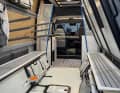 2. Der Ausbauer Rocket Camper bietet modulare Campingbusse an, die auf die speziellen Anforderungen von Wassersportlern wie Surfern oder Seglern ausgelegt sind.