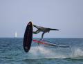 Foivos Tsoupras jumped one-handed to third place