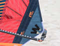 By choosing the clew eyelet you can tune the sail to be more powerful (upper eyelet) or more controllable