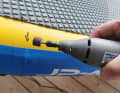 A multi-tool for sanding is useful when carrying out repairs, but it can also be done by hand.