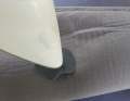 Use the preheated iron (without steam!) to first fix the patch in places