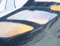 Die Fenster fallen klein aus und sind aus X-Ply-Material