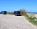 You can park directly on the beach or in a car park about 100 metres from the water's edge