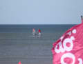 Many slalom riders were out on the water for a warm-up in the crisp easterly wind...