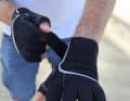 A wide, firm Velcro fastening, which may restrict wrist movement slightly