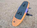 The board is built in an epoxy-wood sandwich construction and costs 1449 euros