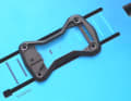 When the mounting plate is fitted, the spacing of the track nuts underneath is automatically adjusted