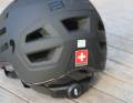 The size can be adjusted at the back of the head, the adjustment wheel is easily accessible