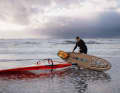 Merijn Tinga uses a specially made board for his journey, which is partly made from recycled plastic waste.