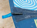 NeilPryde uses the batten tensioner on all models, which can be opened and closed with (strong) fingers or any lever, at least without an exactly fitting key.