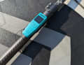 The controller is clipped onto the paddle.