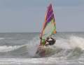 Here, the waves break gently over an offshore sandbank