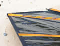 Most freestyle sails don't need any loose leech, because a loosely cut top would quickly cause unrest when ducking. The markings for the luff trim indicate this special feature on some brands, e.g. the RRD Style Pro