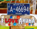 Das Insel-Motto "One Happy Island" - steht auf jedem Autoschild in Aruba.