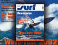 You have to be able to let go sometimes:  Robby Naish cutback one-handed on the cover, Darrlo Wong photographed (presumably) single-fingered