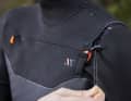The wetsuit can be pulled tight on the chest to prevent water ingress