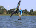Gain momentum on a half-wind course and check the free space downwind.