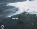 The waves are formed by a shallow lava reef