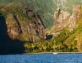 A picture with which the author Schenk awakened South Sea dreams: his "Thalassa" off Fatu Hiva, Marquesas.