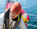 Rely on expert help near the harbour. Patient in a rescue blanket and ashore
