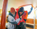 Escort below deck: If the crew member was only in the water for a short time, is clearly responsive and can still move, then go below deck with assistance