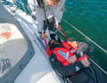 Pull with a safety line: If the person is not conscious, a safety line or harness can be used to move them