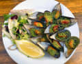 Moules gratinées, mussels au gratin, are a typical delicacy of the region. They are on the menu almost everywhere