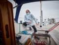 A lightweight inshore oilskin set comprising a jacket and trousers. The thin Slam Shield 20 fabric does away with heavy storm flaps to save weight.