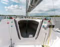 Inside: Halyards and trim equipment are arranged around the companionway. Inside there is a small footwell in front of the berth area