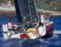 First among the Protos and the hunted: Carlos Manera, here with crew at the "Palma Parade" | La Boulangère Mini-Transat/A. Pilpré
