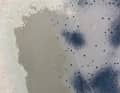 The antifouling was removed here with solvent, revealing suspicious spots