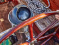The new steering wheel on the classic column with the large compass is actually an old one from another ship
