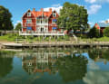 The Scandinavian-style "Göta Hotel" is located on the banks of the canal in Borensberg