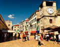 The pedestrian zone of Kotor, the main town in the bay, is still bustling in October