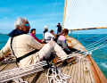 No sea fence, narrow deck, little freeboard. "Kelpie" conveys sailing directly