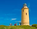 Tourists in front of the lighthouse on the Danish island of Sejerø